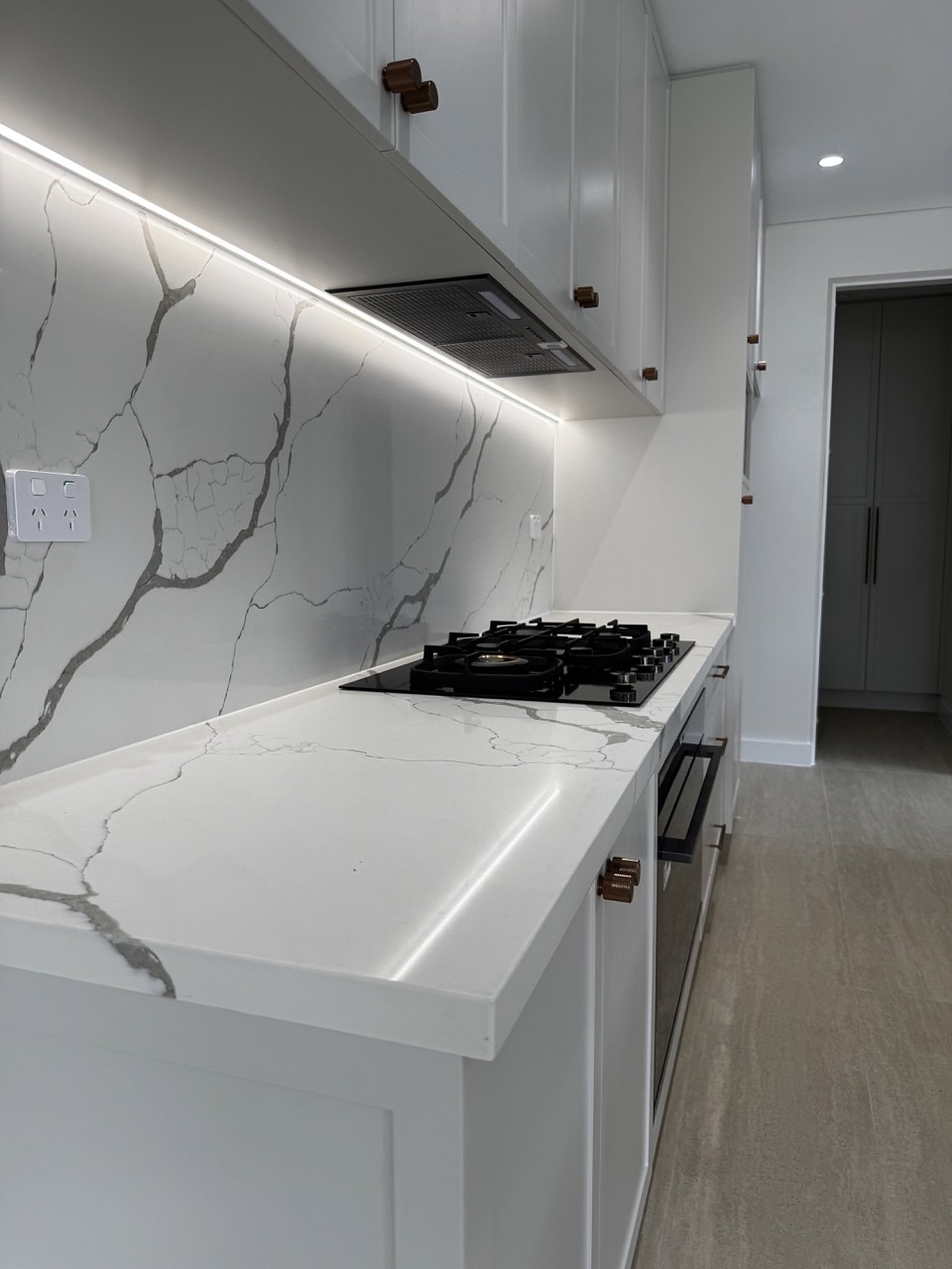 Guildford Duplex kitchen stone splashback and cabinetry